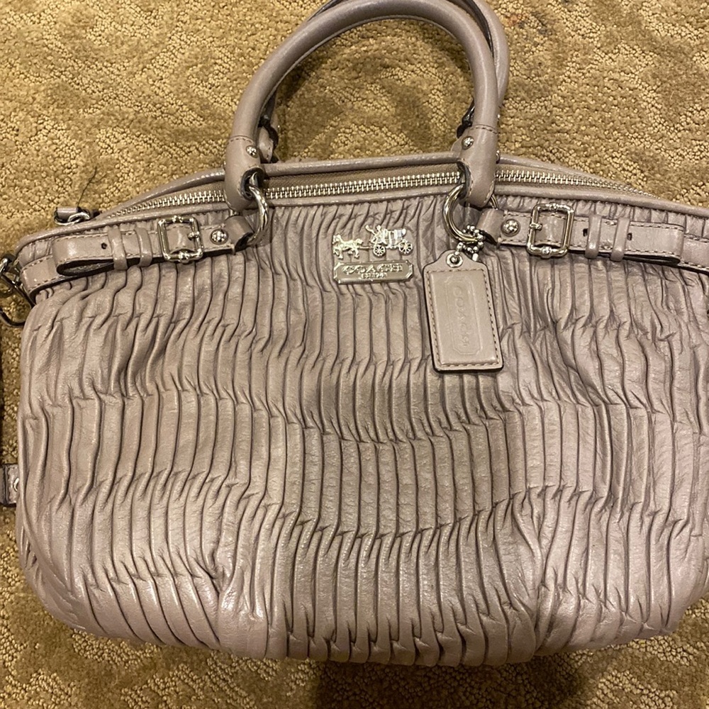 Coach purse. Brown texture color. Perfect condition